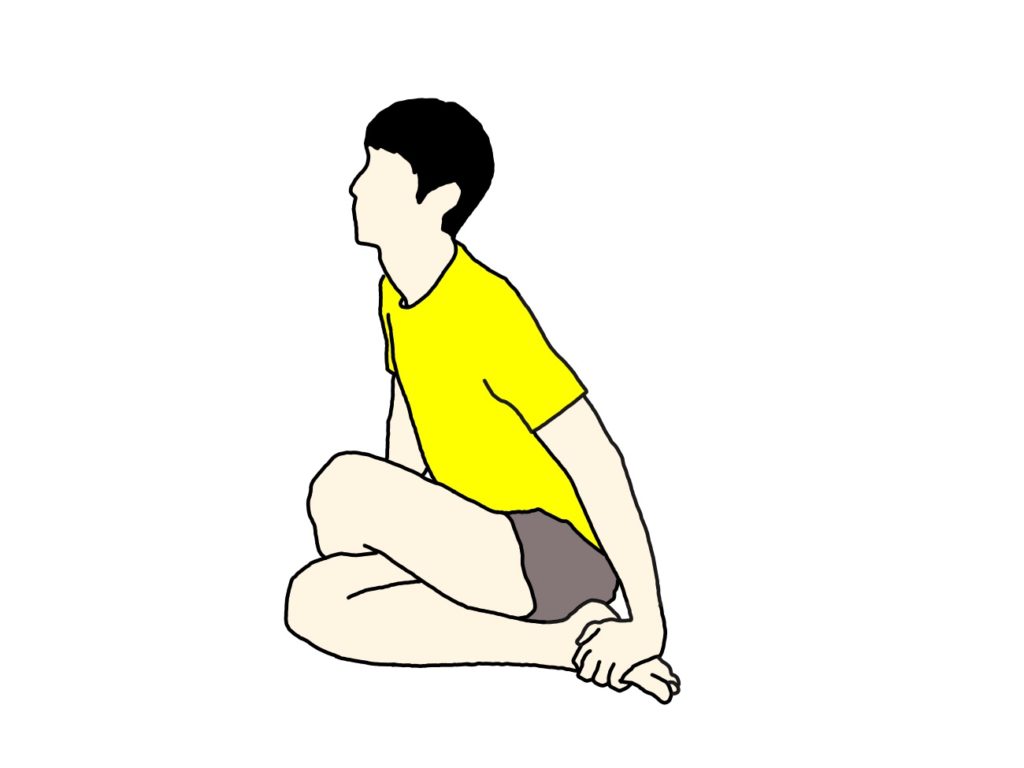 膝を体の中央で組んだ姿勢で行うお尻（殿筋群）の筋肉のストレッチの方法