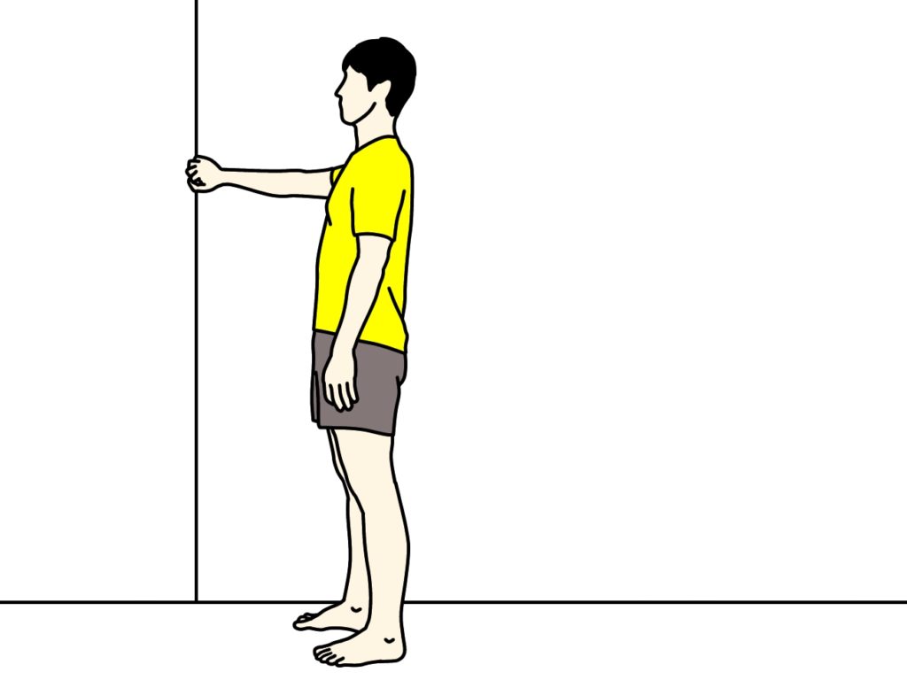 壁の角を使って行う背中のストレッチ