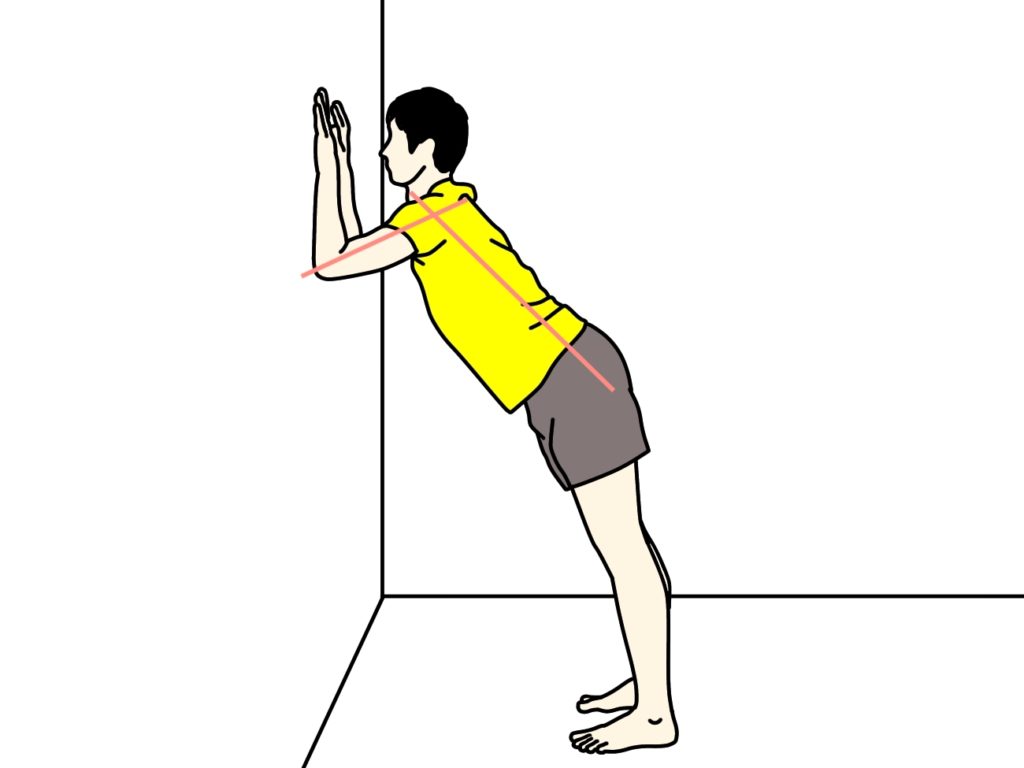壁を使って行う二の腕と背中とお腹のストレッチ