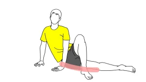 床で行う大腿筋膜張筋のストレッチ
